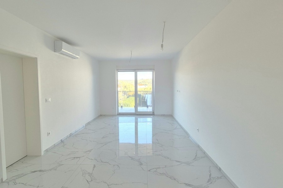 Light-flooded living room with a view