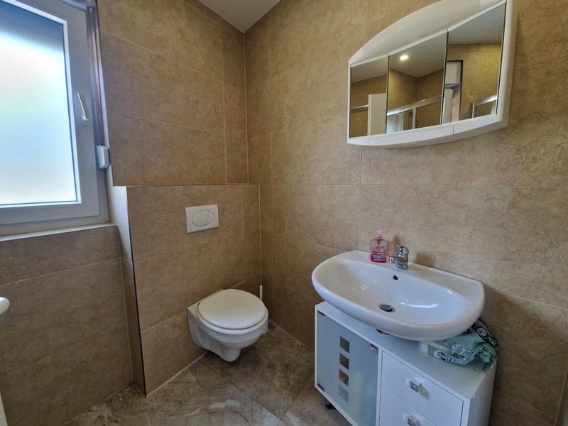 Bathroom with toilet and sink