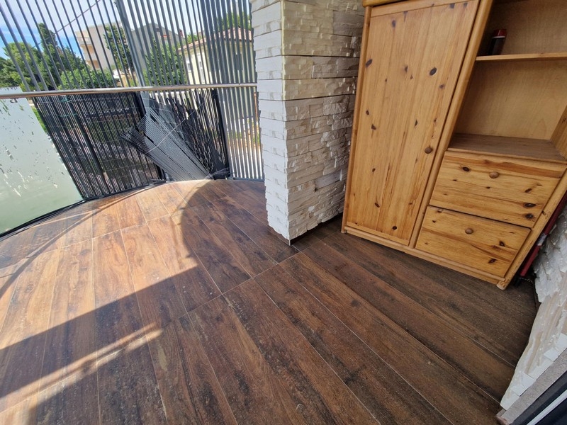 Covered loggia with cupboard