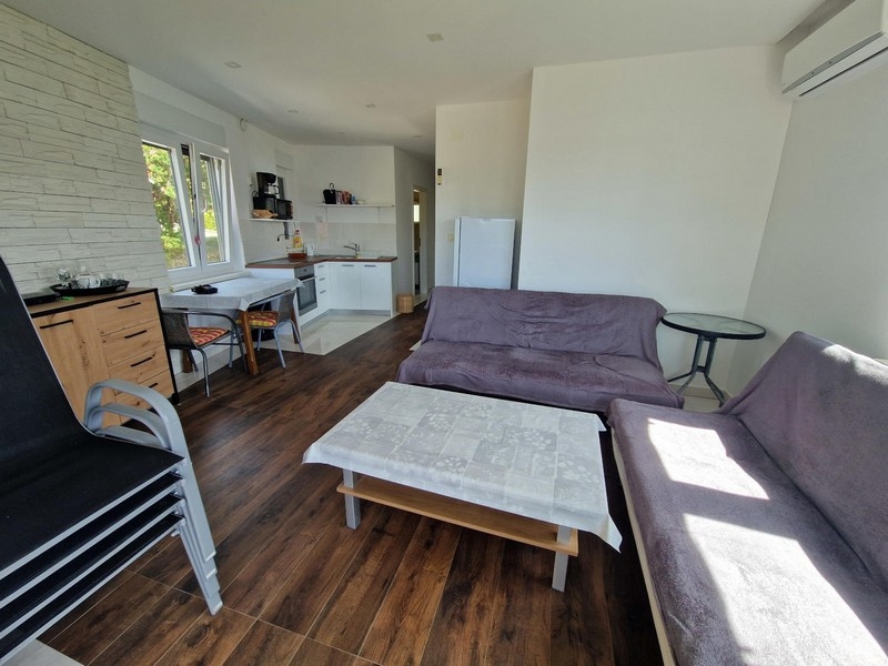 Living room with open kitchen