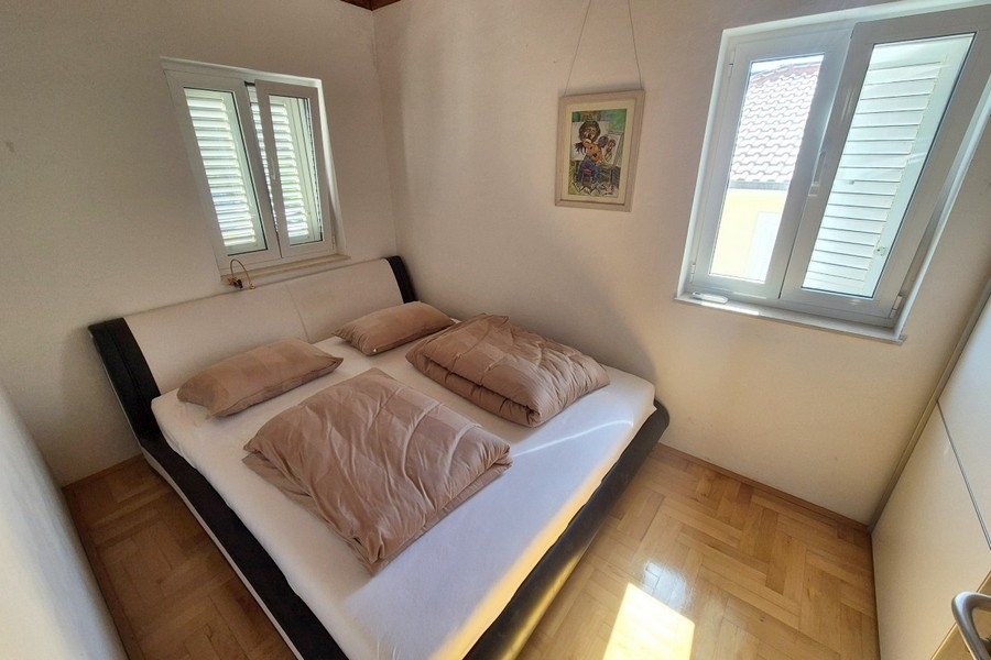 Bright bedroom with double bed