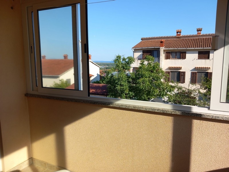 Apartment with sea view in Liznjan