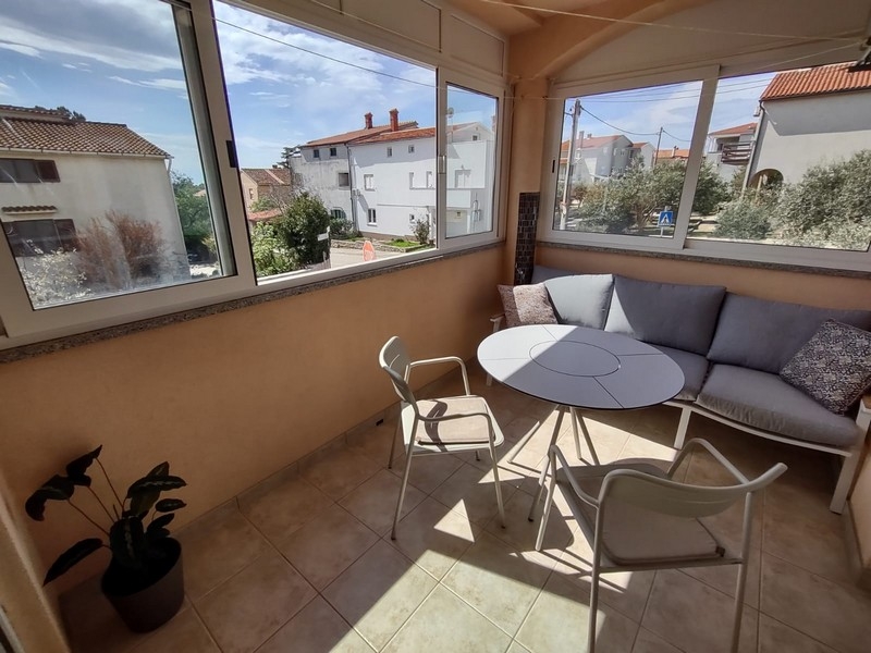 Glazed balcony with sea views
