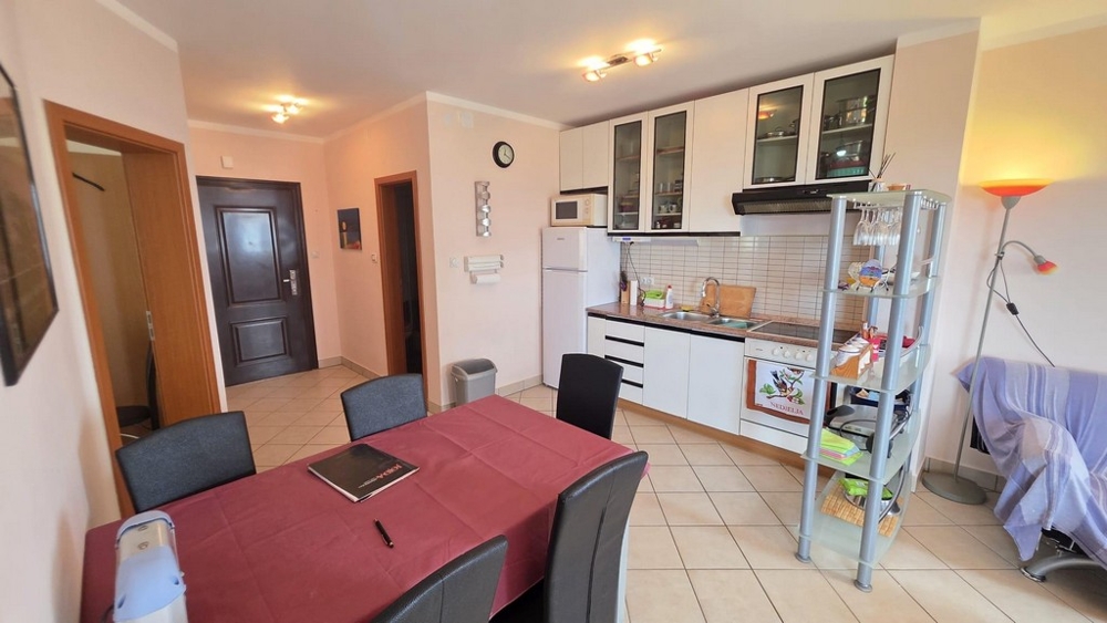 Living room with kitchen and table