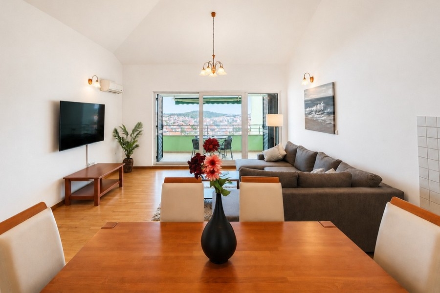 Living room with sofa and sea view