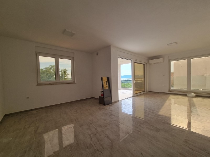 Bright living area of ​​the new apartment in Njivice on Krk