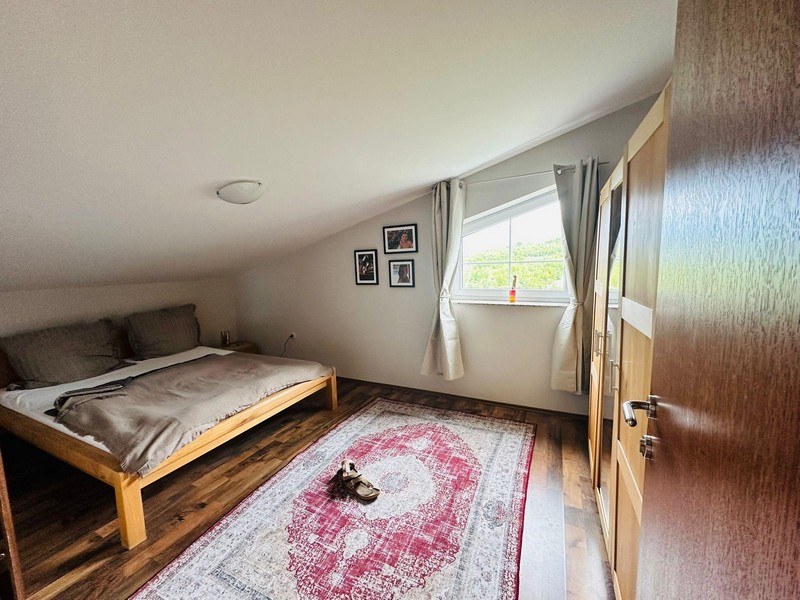 Bedroom with double bed and wardrobe