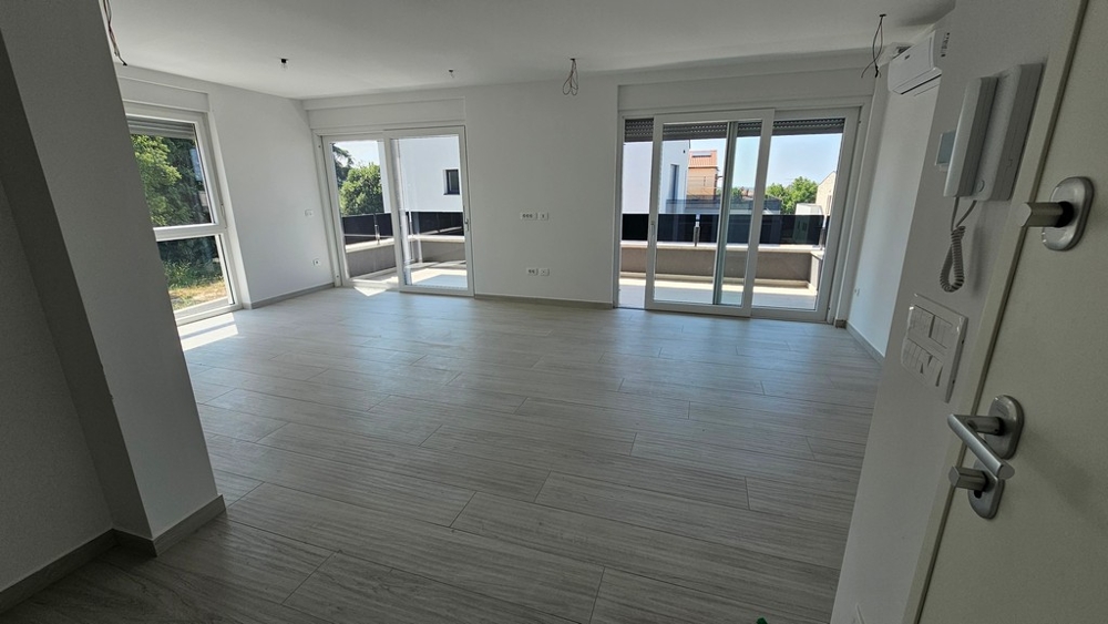Bright living area with large windows