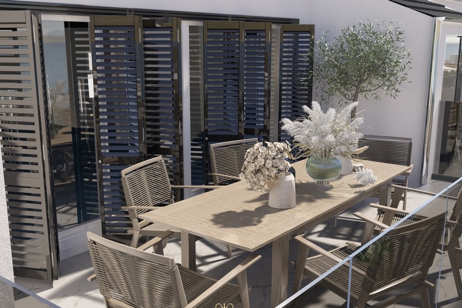 Terrace with seating area and sea views