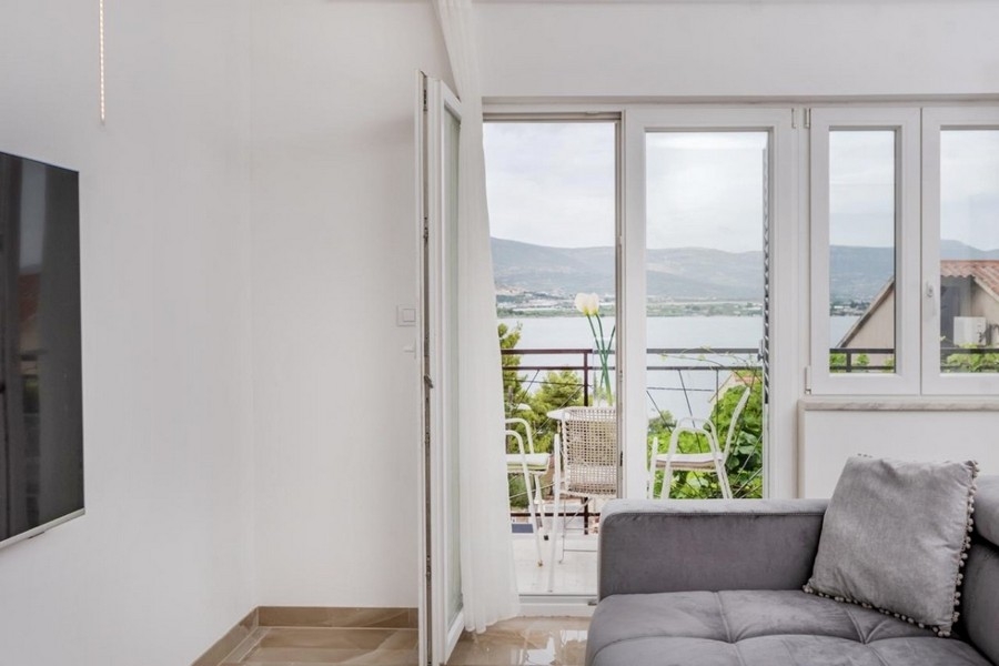 Living room with large windows and sea views