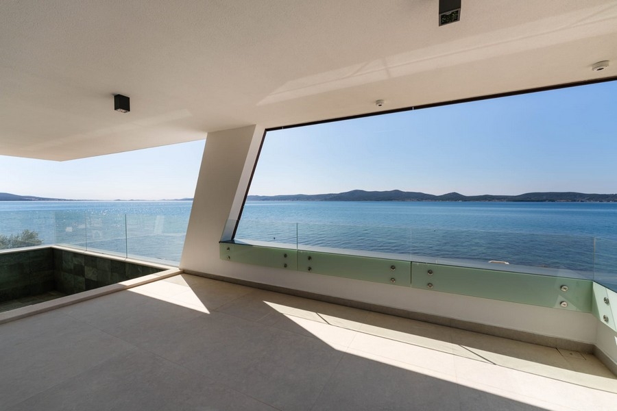 Covered terrace with sea views of a new apartment in Sukosan