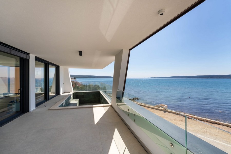 Terrace with pool and views of the beach and sea