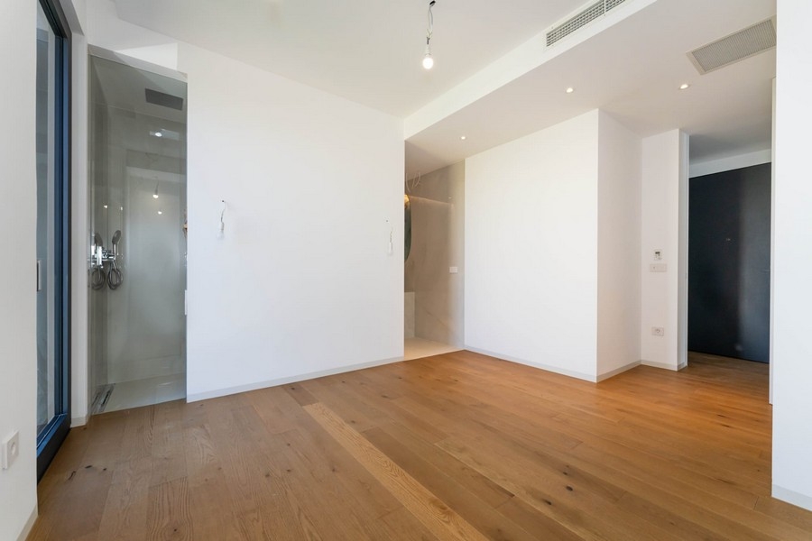 Bedroom with wooden floor