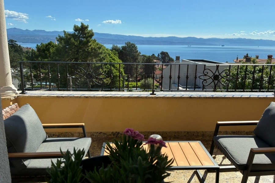 Terrace with seating area and sea view in Lovran