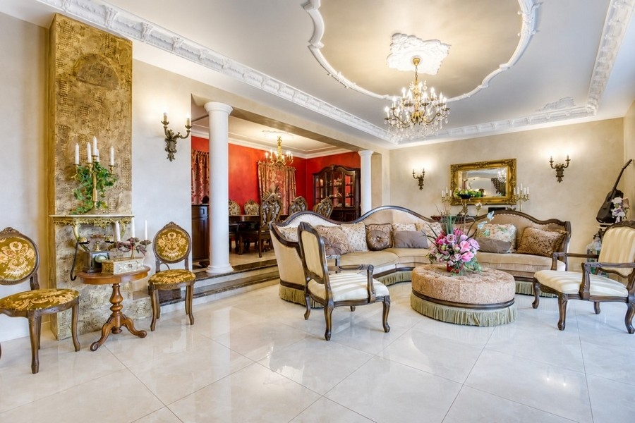 Living area with elegant seating area and stucco elements