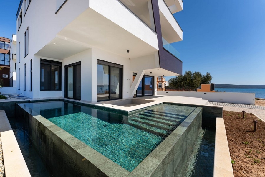 Newly built apartment with pool right by the sea in Sukosan Croatia