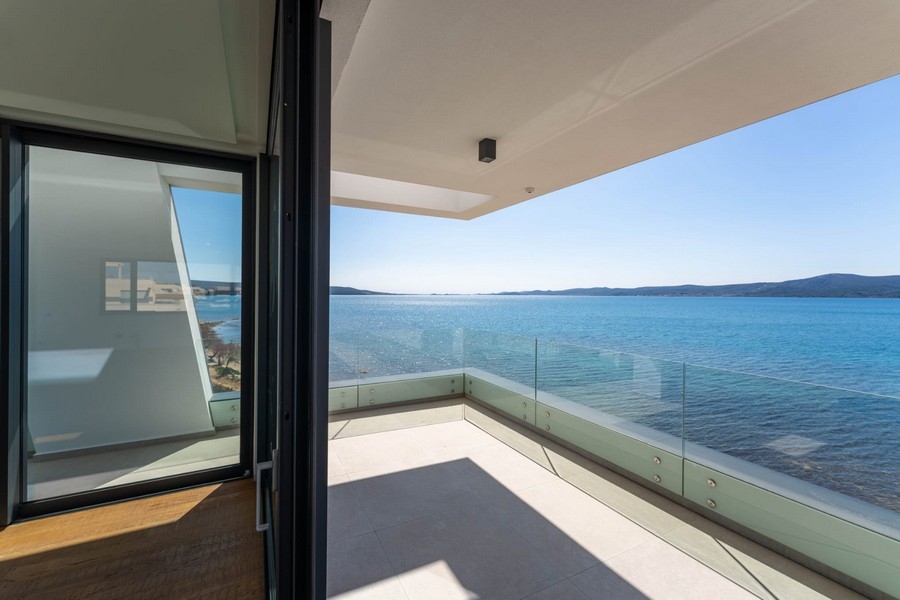 Terrace with glass railings and sea views in Sukosan