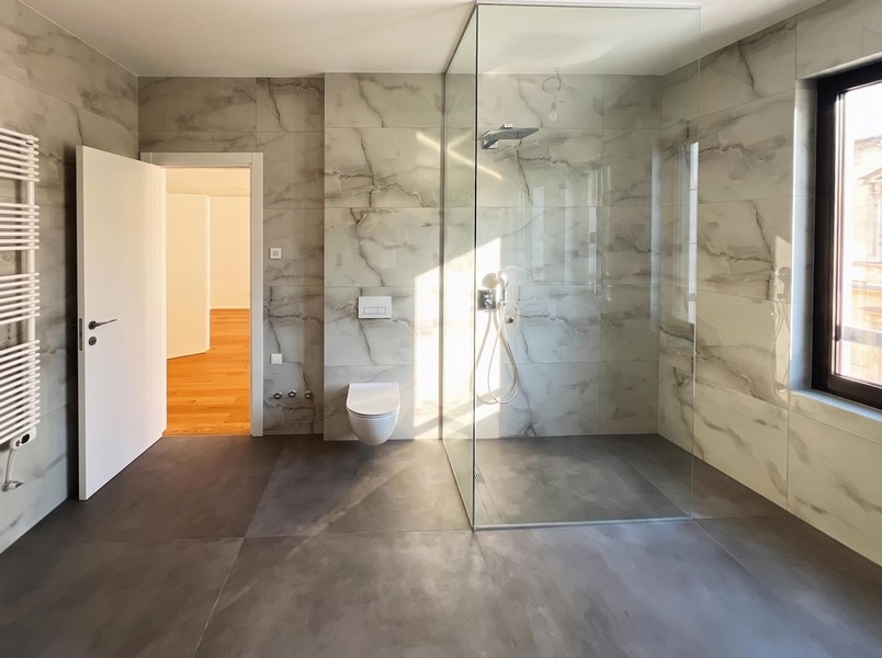 Second bathroom with floor-level shower