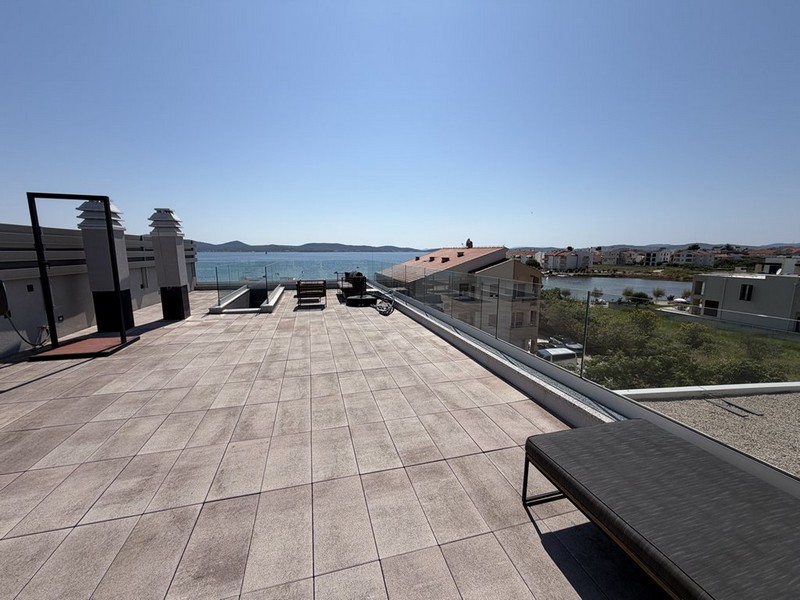 Large roof terrace overlooking the sea