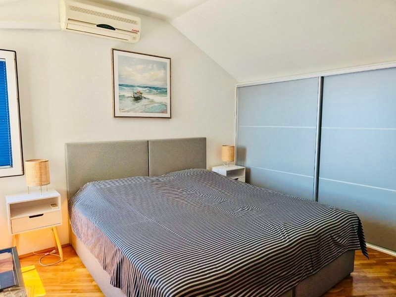 Attic bedroom with air conditioning