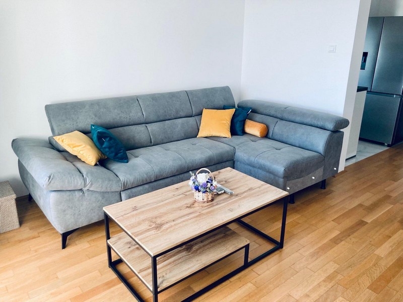 Living area with corner sofa and coffee table