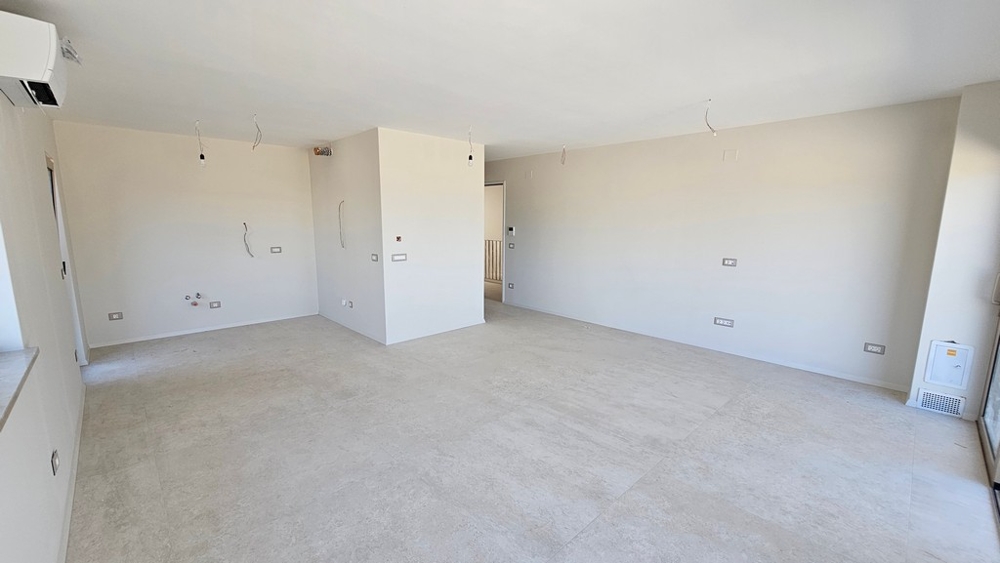 Open living area with porcelain tiles