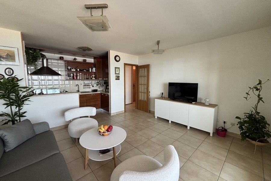 Living area with open kitchen