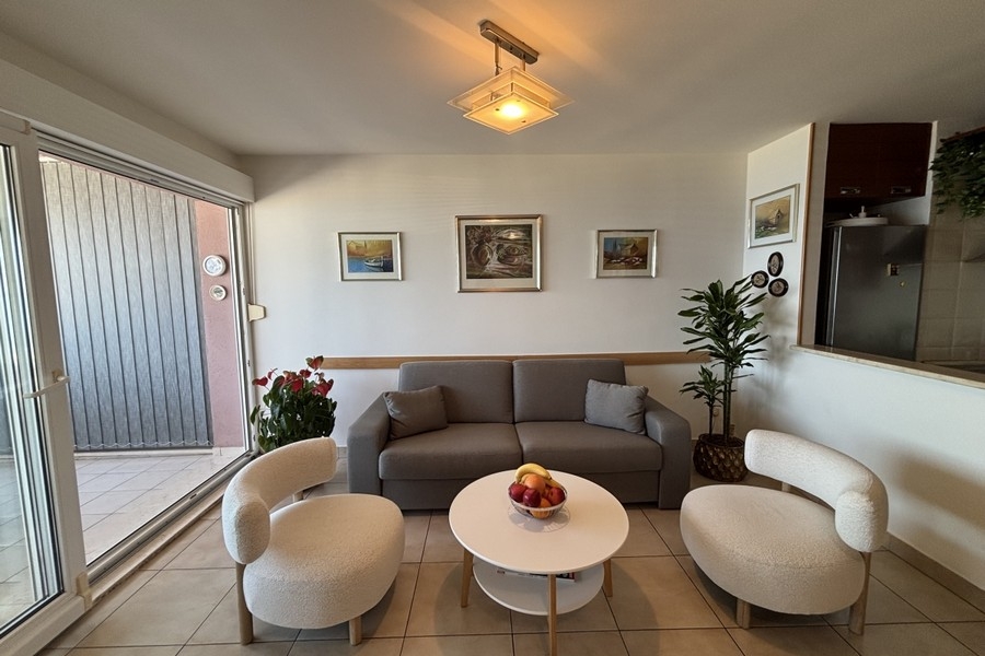 Living room with sofa and armchairs