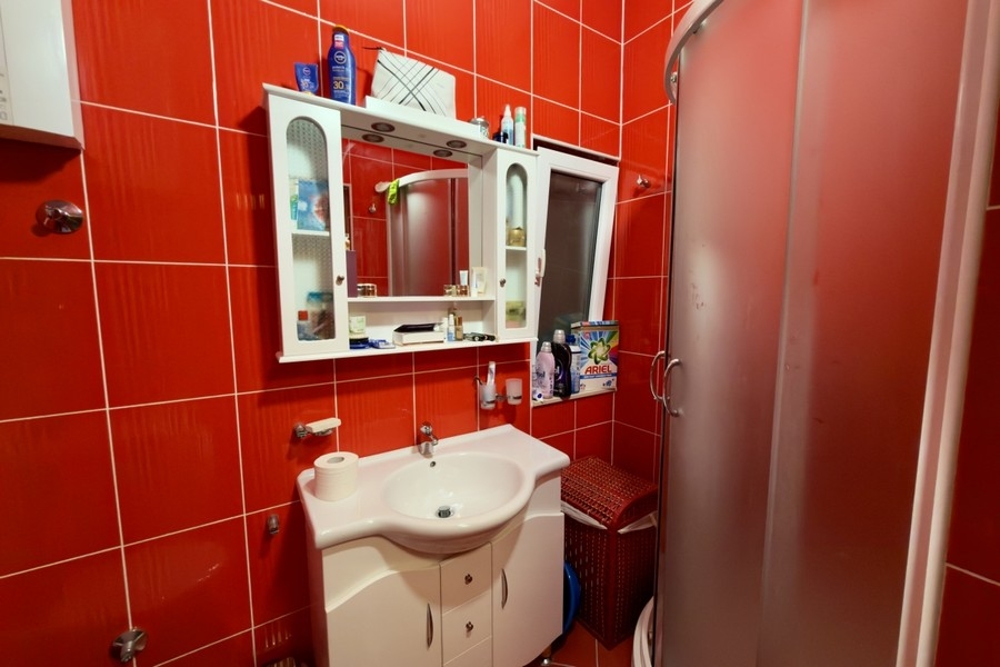 Bathroom with shower and sink