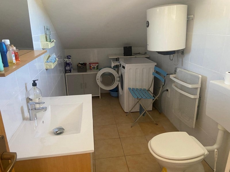 Bathroom with washing machine