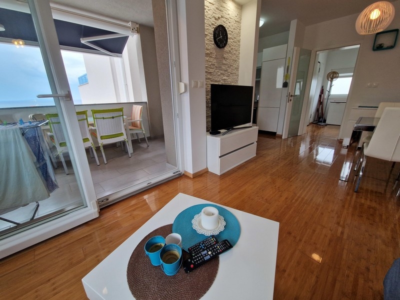 Living area with access to the covered terrace