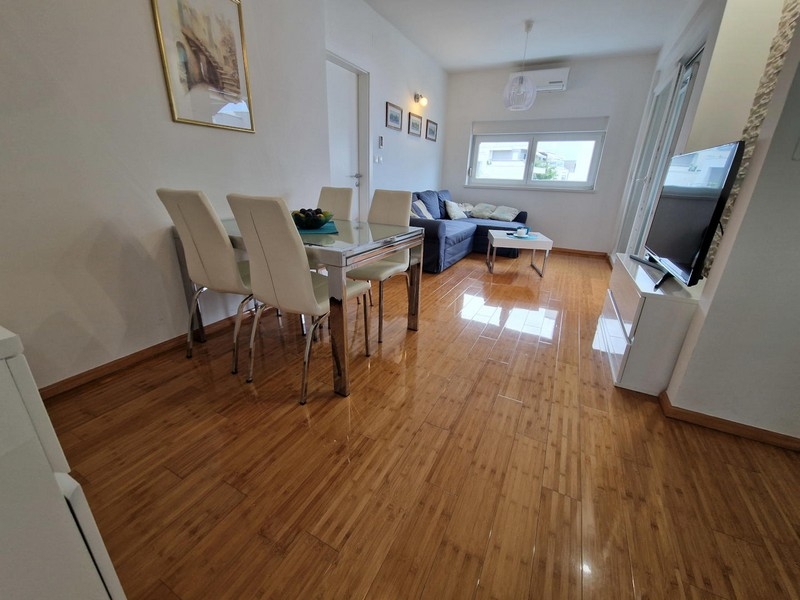 Bright living room with dining table and sofa
