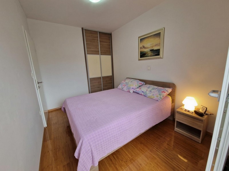 Bedroom with double bed and built-in wardrobe