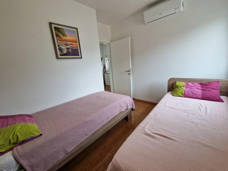 Second bedroom with two single beds