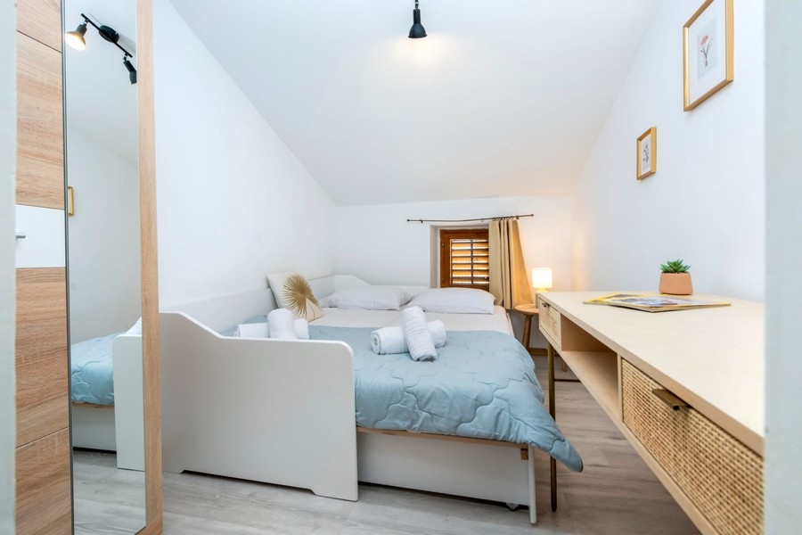 Second bedroom with additional bed