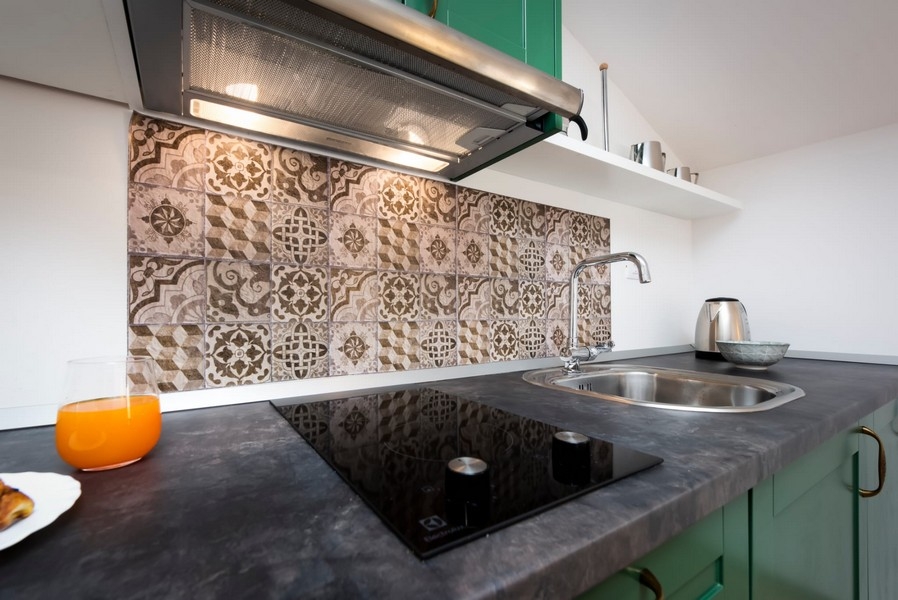 Cooking area with hob and sink