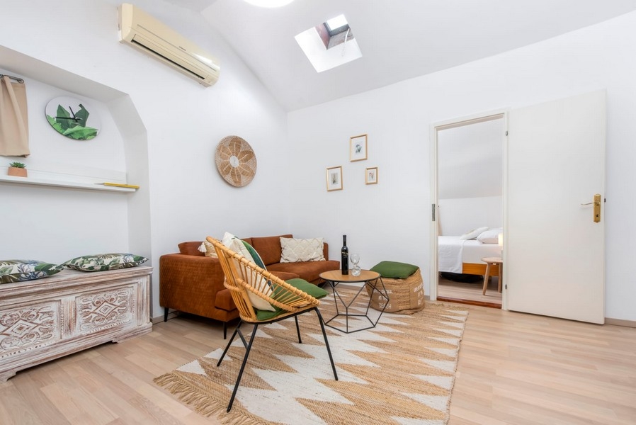 Living area with a view of the bedroom