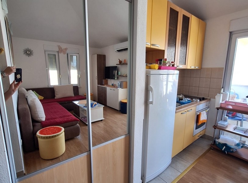 Living area with kitchen in apartment in Croatia