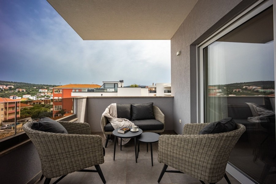 Covered terrace with seating area