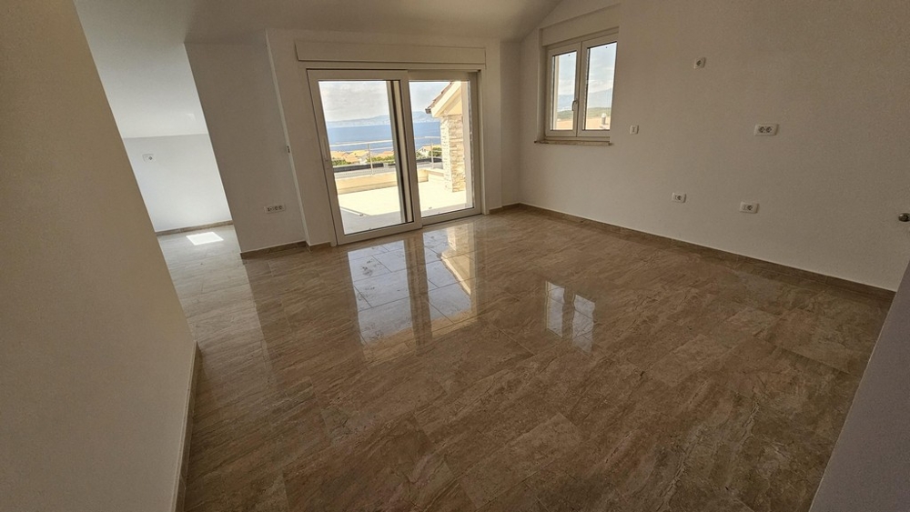 Bright living room with sea views