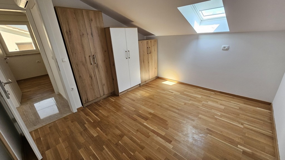 Hallway area with built-in cupboard