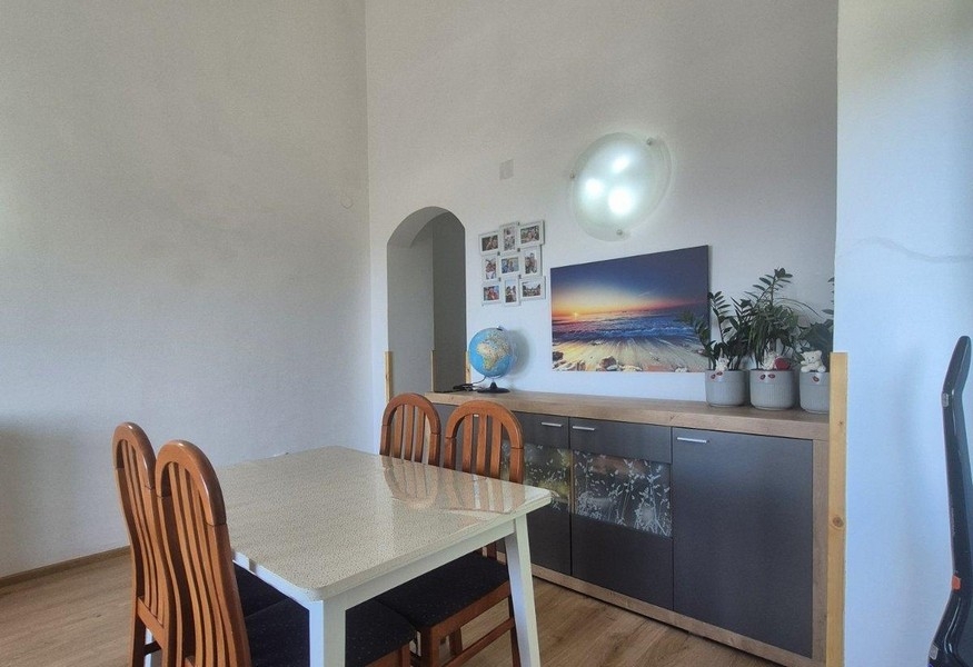 Dining area with table and sideboard