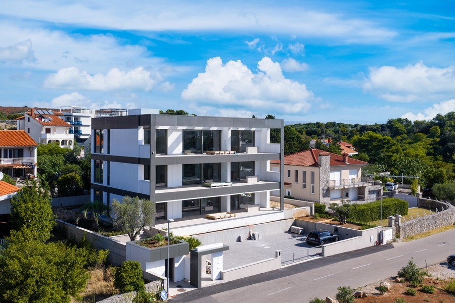 Residential house in Krk from the air with a view of the sea