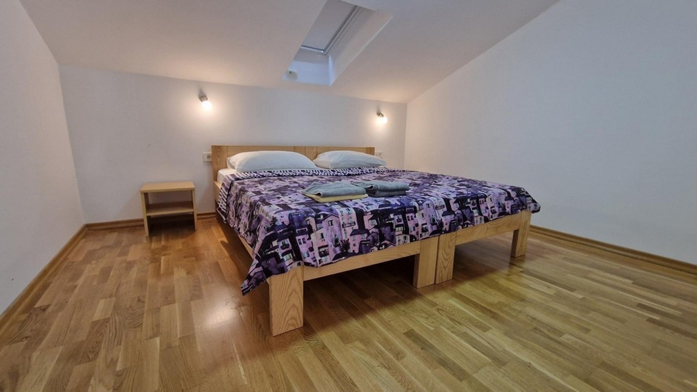Second bedroom with skylight in the apartment on Krk