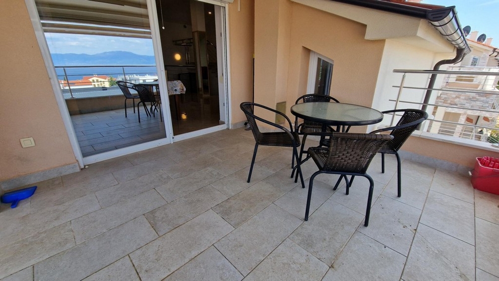 Terrace with seating area and access to the living room in Njivice