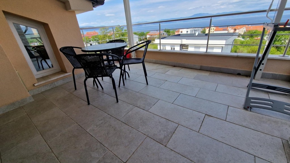 Sunny terrace of the attic apartment on the island of Krk