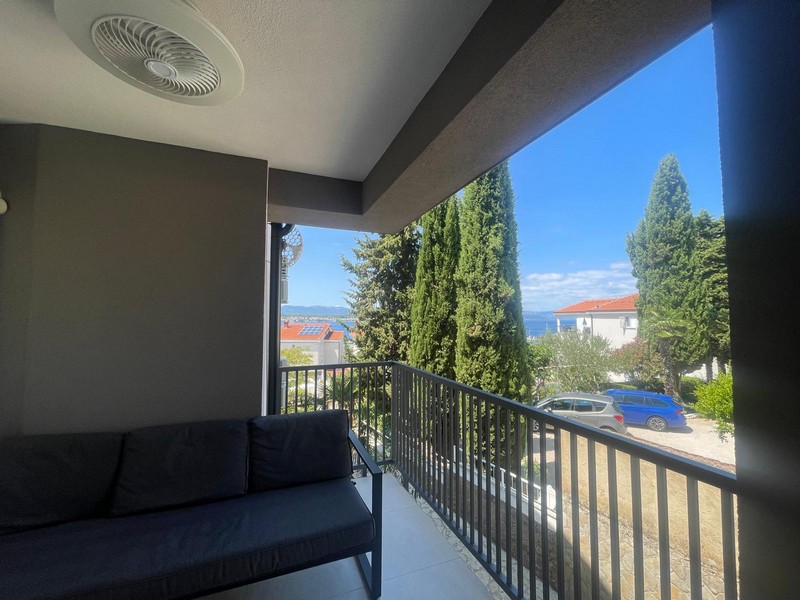 Balcony with seating area and sea view in Malinska on Krk