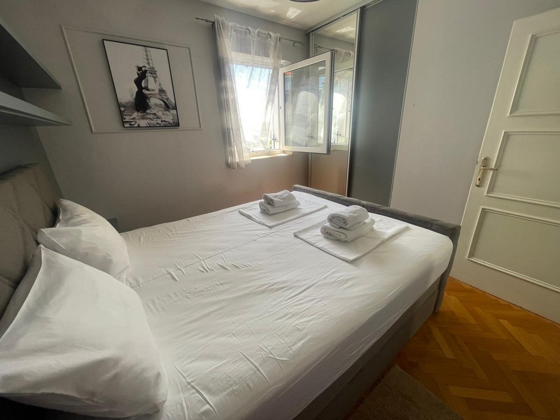 Second bedroom with double bed and window