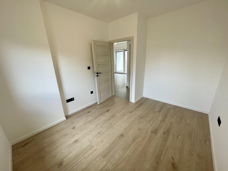 Second bedroom with wooden floors