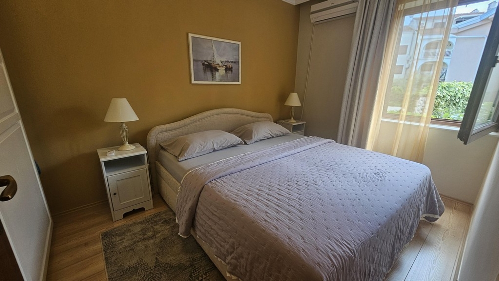 Bedroom with double bed and window to the garden